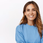 portrait-ambitious-confident-adult-30s-woman-cross-arms-smiling-happy-front-looking-forward-standing-against-white-wall_176420-40694